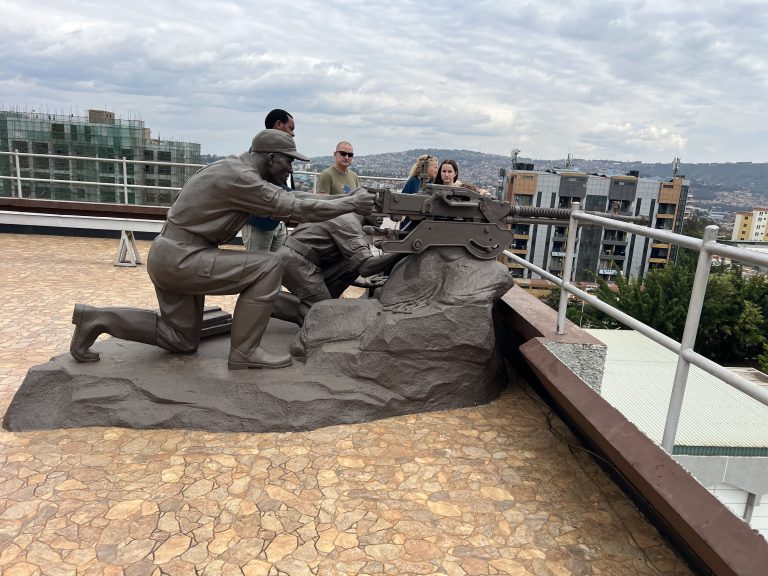 View of Kigali’s green hills with the monument of two RPF soldiers at the Campaign Against Genocide Museum, a key stop on Huza Gateway’s city tour.