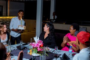 Birthday cake celebration at a hotel after gorilla trekking in Rwanda’s Volcanoes National Park