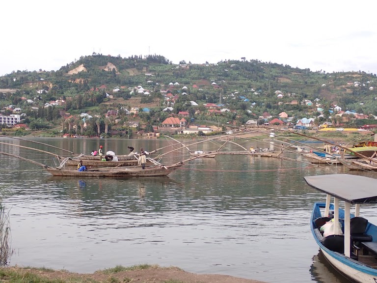 Places to Visit in Rwanda - Gisenyi is a lively beach town known for warm weather, sandy beaches and its close views of Goma. Travelers enjoy Gisenyi city tours, hot springs, Nengo trail, tea tours and sunset experiences on Lake Kivu.